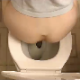 We are not certain if this is a voyeur video or if the woman taking this huge shit was aware she was being recorded. Regardless, she takes a massive shit, and it is a nice clip! About 1.5 minutes.